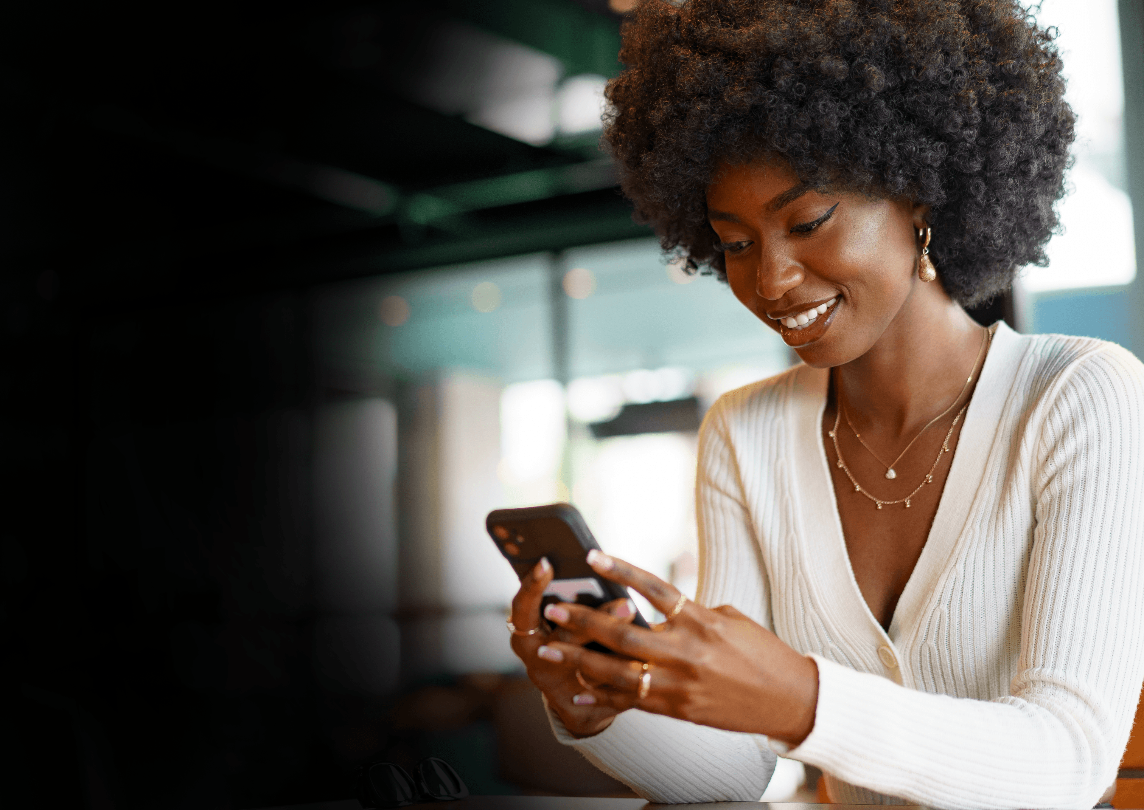 A business founder interacting with Plug chatbot on mobile device